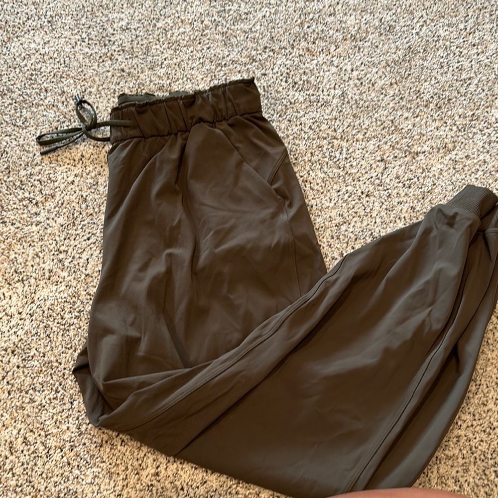 Never worn olive green lululemon joggers